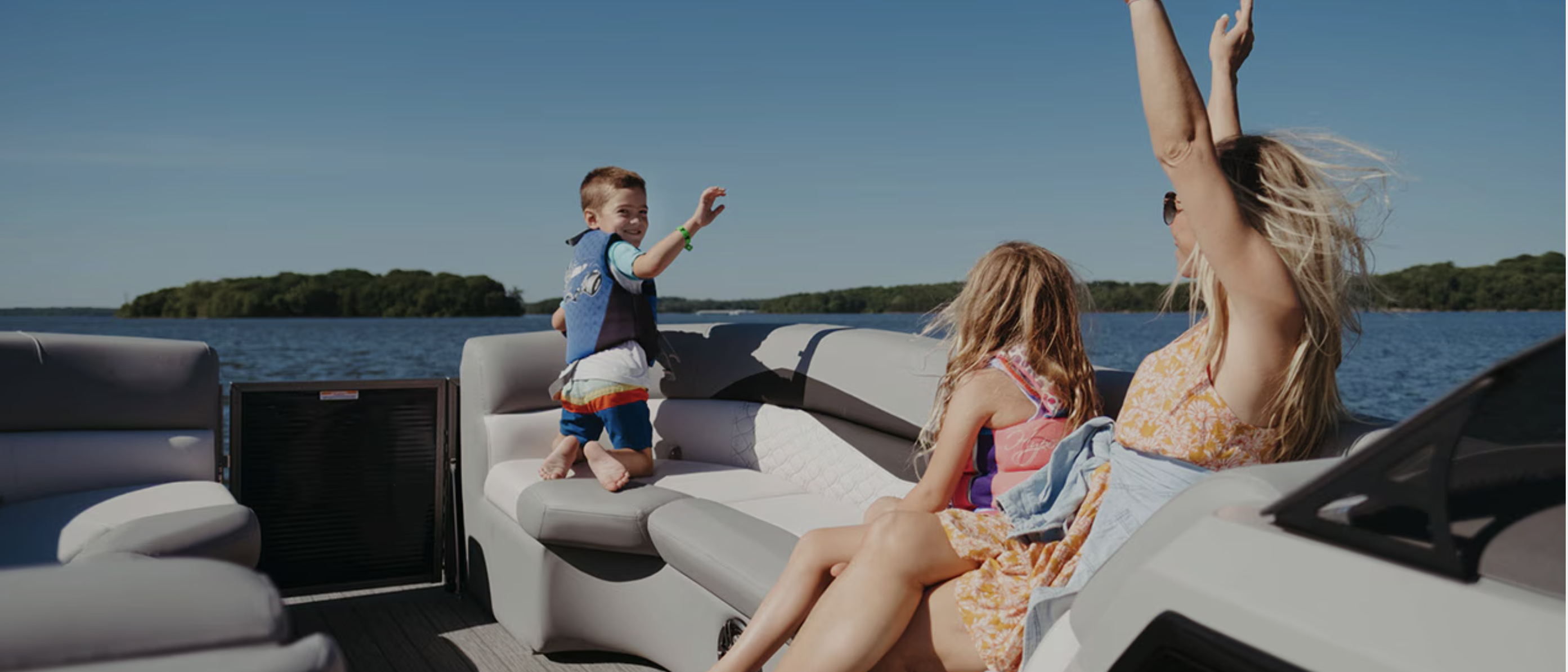 Family enjoying a day on their boat